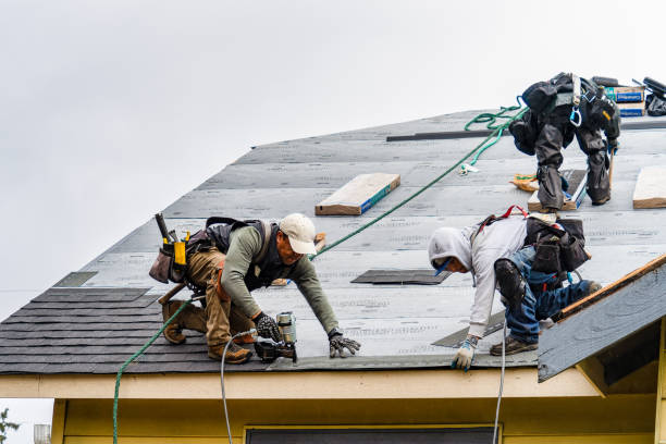 Professional Gutter Installation technician working in Frederick, OK